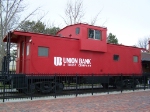 Ex-BN 10164 (Caboose) Is Now On Display at the Union Bank Location Housed Inside the Former CRI&P Depot